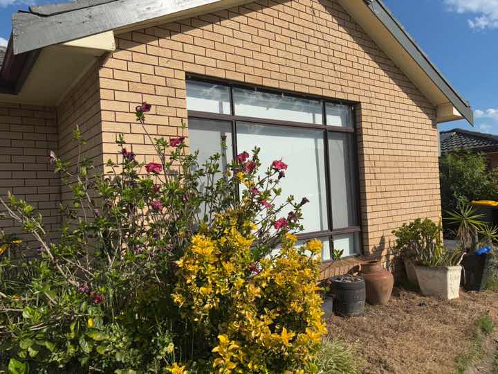 Gaps Around Exterior Window Frames — real finishes defect photographed in a SURE Building Inspections report