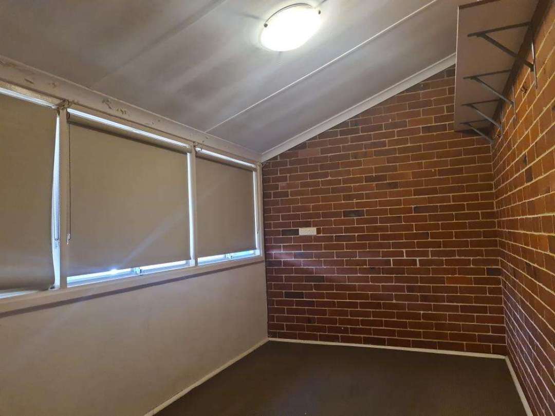 Excess Moisture in Walls Adjacent to Wet Areas — real moisture defect photographed in a SURE Building Inspections report