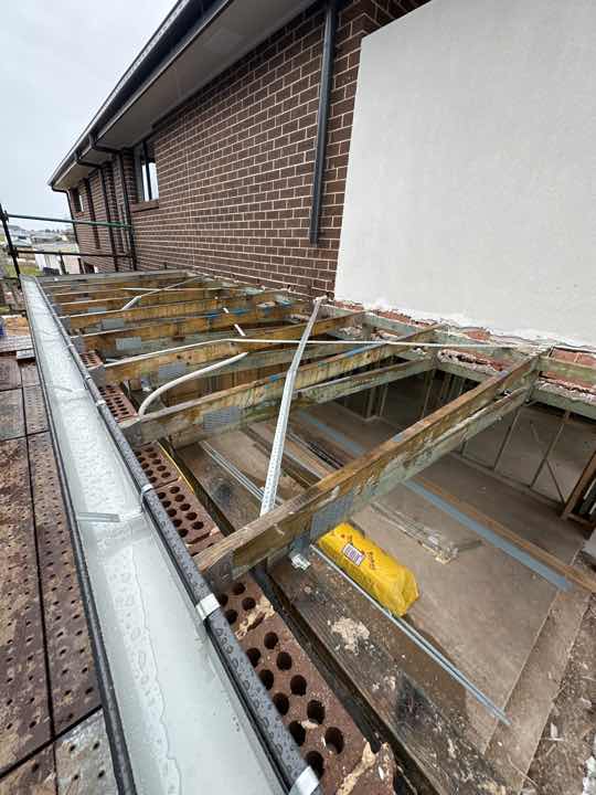 Missing Roof Cross Bracing — real roofing defect photographed in a SURE Building Inspections report
