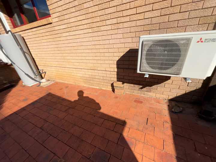 Inadequate Ventilation System — real moisture defect photographed in a SURE Building Inspections report