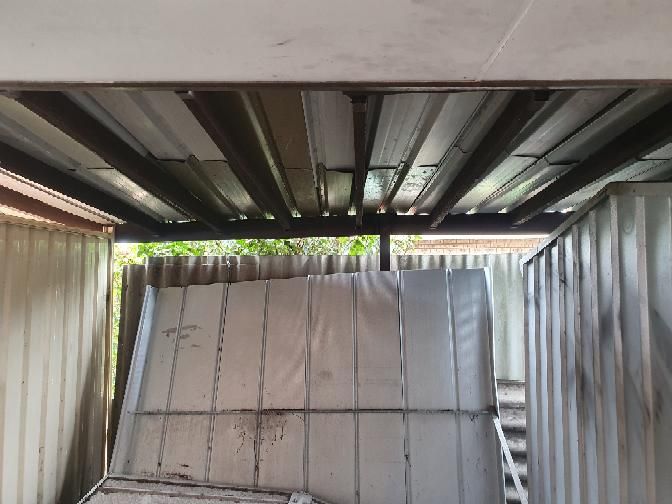 Unstable Decking Posts — real structural defect photographed in a SURE Building Inspections report