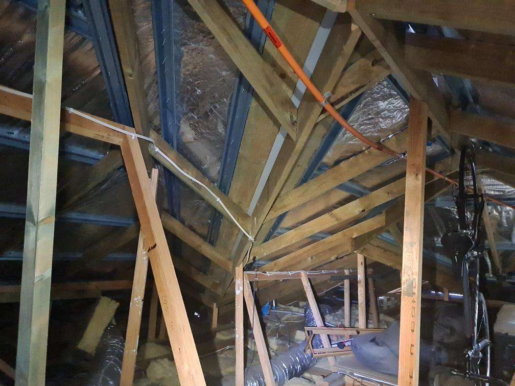 Aged Roof Framing Timbers — real structural defect photographed in a SURE Building Inspections report
