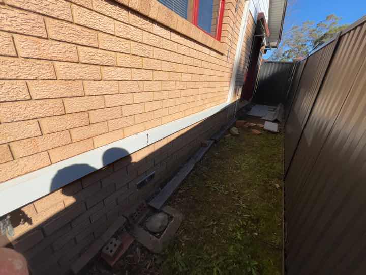 Inadequate Ventilation System — real moisture defect photographed in a SURE Building Inspections report
