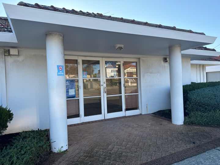 Exterior Surface Paint Deterioration — real finishes defect photographed in a SURE Building Inspections report