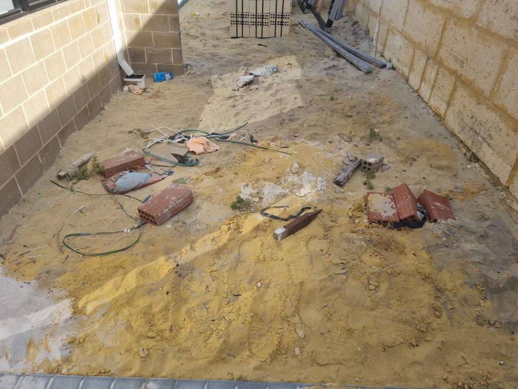 Uncompleted Landscaping — real finishes defect photographed in a SURE Building Inspections report