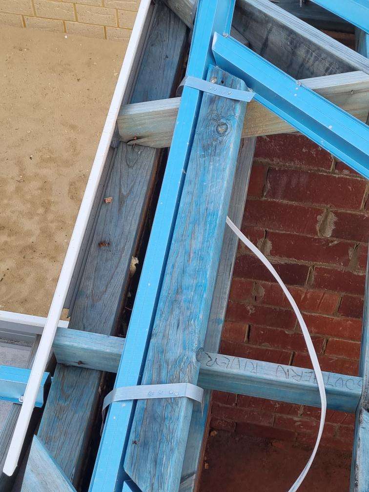 Incomplete Roof Plumbing — real roofing defect photographed in a SURE Building Inspections report