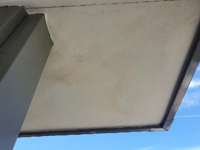 Ceiling Stains with Potential Leak — real moisture defect photographed in a SURE Building Inspections report