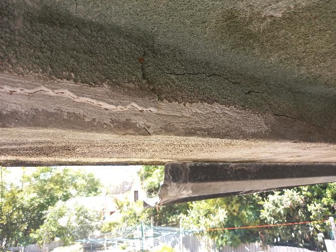 Balcony Flooring Leak — real moisture defect photographed in a SURE Building Inspections report