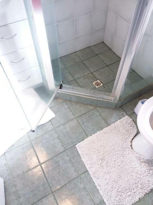 Missing Waterproofing Certificate — real compliance defect photographed in a SURE Building Inspections report