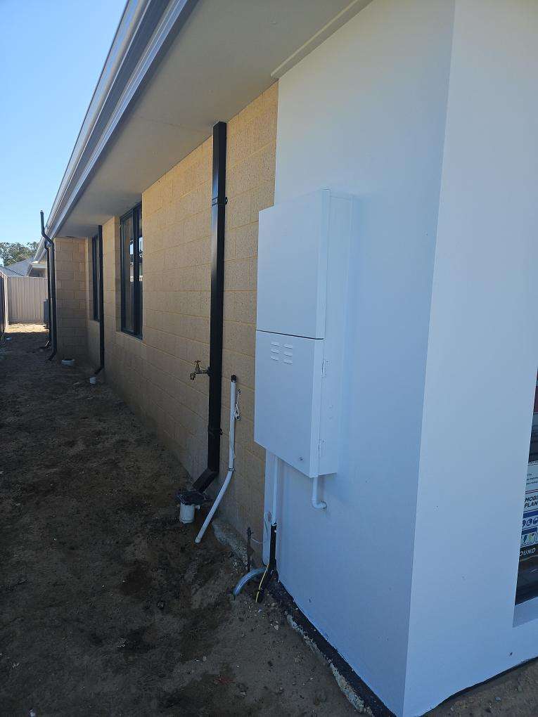 Exterior Walls Require Acid Clean — real finishes defect photographed in a SURE Building Inspections report
