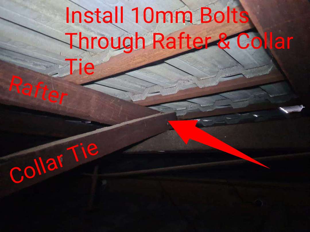 Missing Roof Bracing and Tiedowns — real structural defect photographed in a SURE Building Inspections report