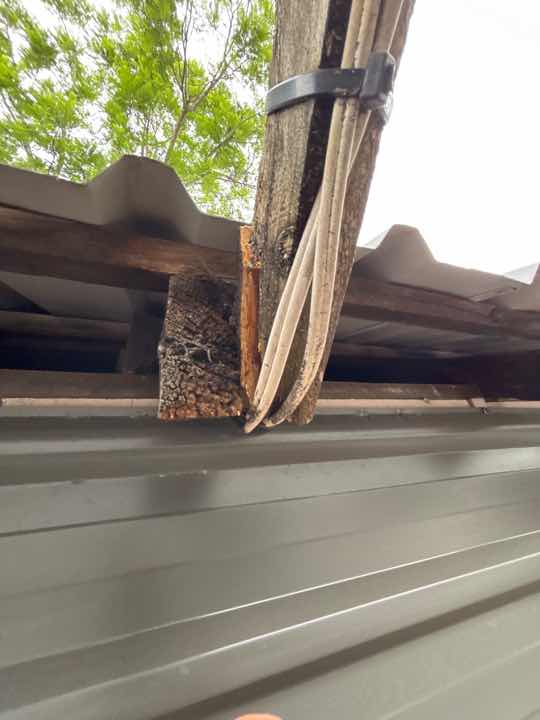 Damaged Door Lock — real structural defect photographed in a SURE Building Inspections report
