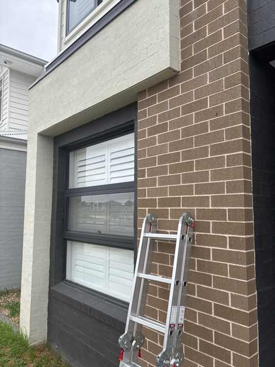 Exterior Cladding Join Cracks — real finishes defect photographed in a SURE Building Inspections report